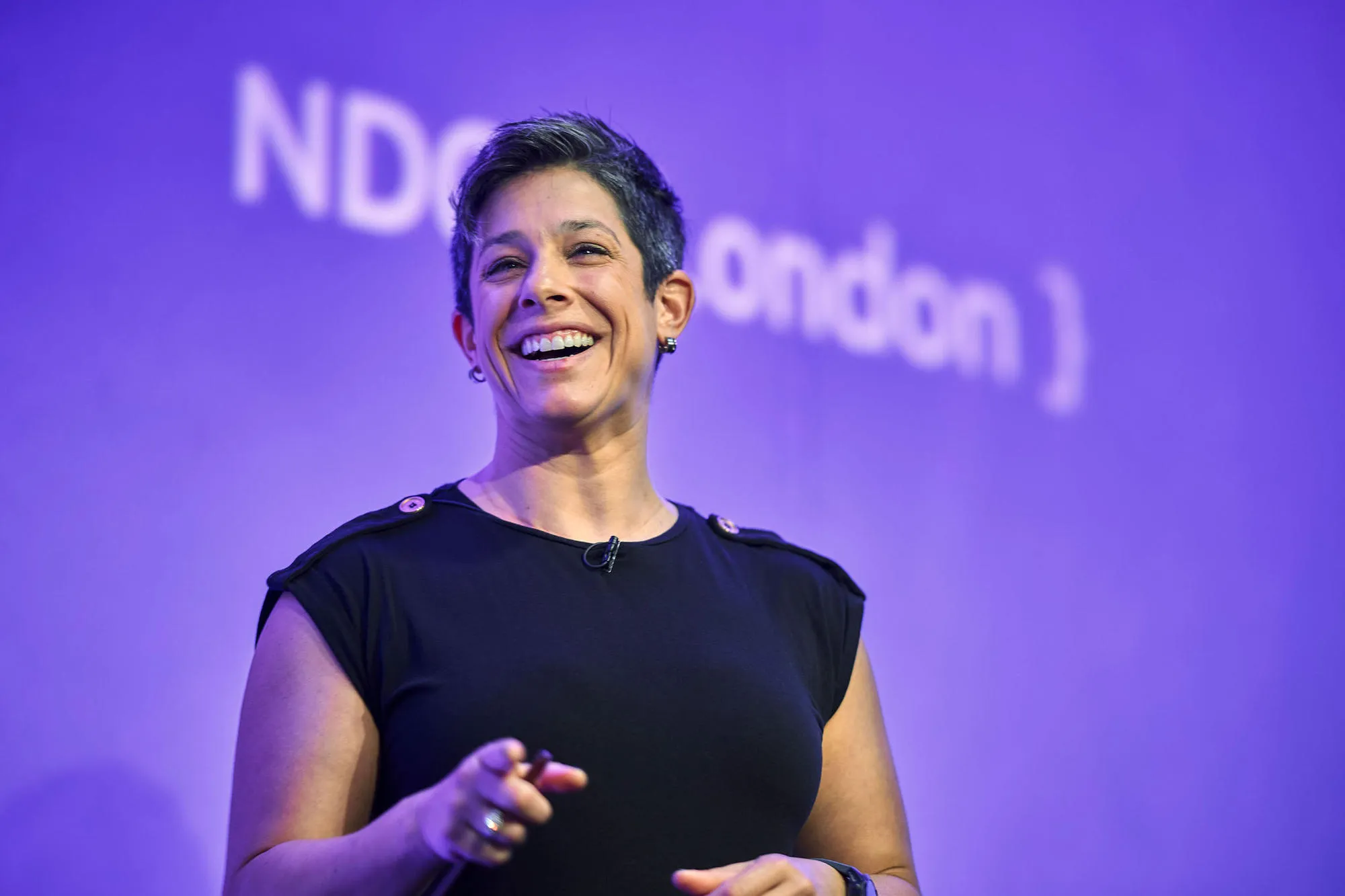 April Yoho speaking on stage at NDC London